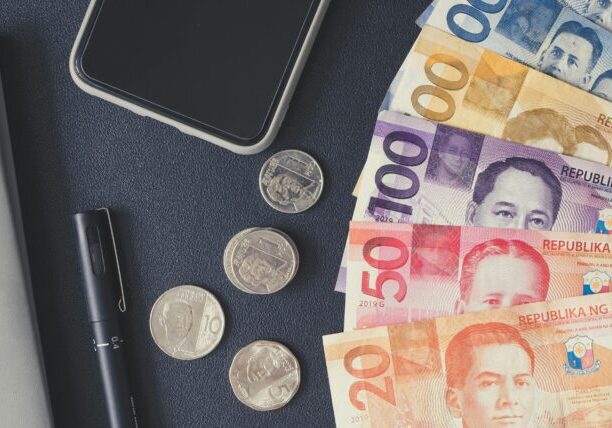 Photo by Angie Reyes: https://www.pexels.com/photo/philippine-money-on-black-surface-6921969/
